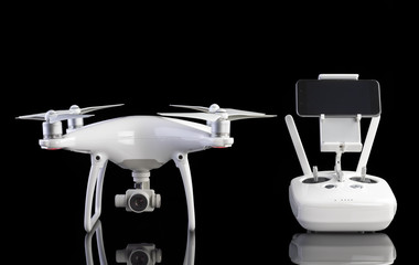 White drone against black background. - obrazy, fototapety, plakaty