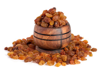 raisins in a wooden bowl isolated on white background