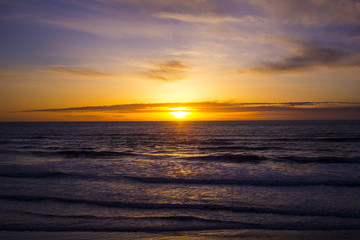 Fototapeta na wymiar Beach sunset with lots of color