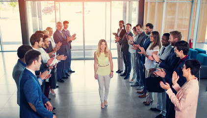 Fototapeta premium happy smiling business partners applauding.