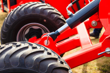 Obraz na płótnie Canvas Detailed closeup agricultural machinery, big tires