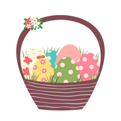 Brown Easter basket with colorful painted eggs and grass