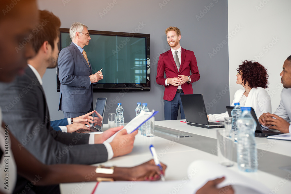 Wall mural smiling manager in discussion with director of company