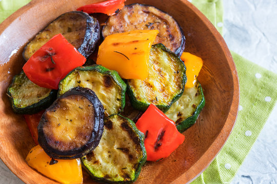Grilled vegetables salad with zucchini, eggplant, onions, peppers and herbs