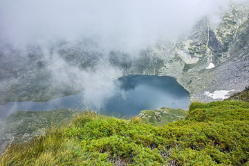 Fototapeta premium Amazing view with Fog over The Twin lake, The Seven Rila Lakes, Bulgaria