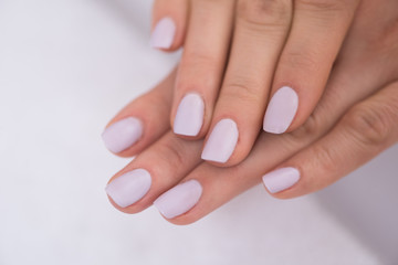 Fototapeta premium woman fingers with french manicure
