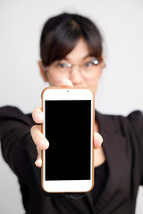Asian women show blank screen of cellphone