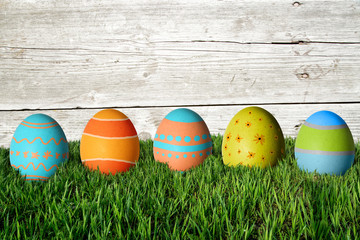 Easter eggs in green grass. Happy Easter.
