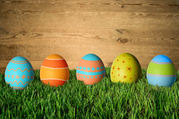 Easter eggs in green grass. Happy Easter.