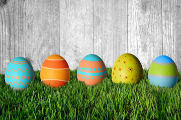Easter eggs in green grass. Happy Easter.