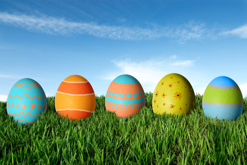 Easter eggs in green grass. Happy Easter.