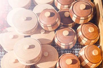 Empty wooden bowl with a lid