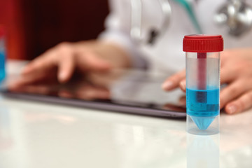 Doctor Using Digital Tablet