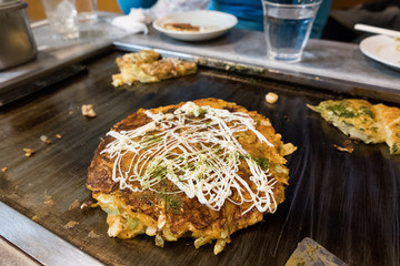 Okonomiyaki, the street food Japanese pancake