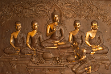 Detail at the base of the Sitting Buddha in the Wihan of Wat Pa Phu Kon,Thailand.