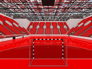 Beautiful sports arena for handball with red seats and VIP boxes