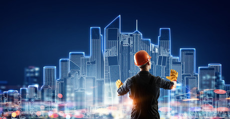 Builder man using media interface . Mixed media