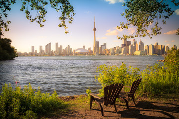 View of Toronto Cityscape during sunset taken from Toronto Central Island - obrazy, fototapety, plakaty