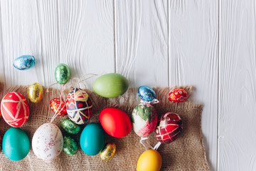 Fototapeta na wymiar Easter concept eggs on a wooden background