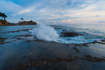 Wave Breaking at Tide Pool during Evening Sunset on Neil Island of Andaman Islands in India