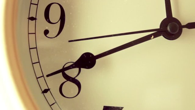 Broken clock hand ticks back and forth