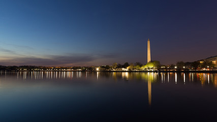 Washington Monument across Tidal Basin during cherry blossom festival, Washington DC. Washington...