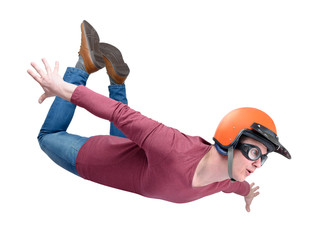 Crazy man in red helmet is flying isolated on white background. File contains a path to isolation.