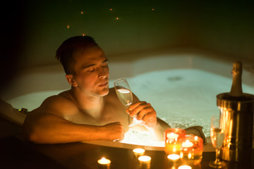 man relaxing in the jacuzzi
