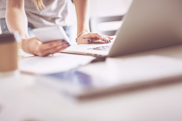 Woman use of mobile phone in university