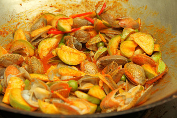Cooking , Stir fried clams and eggplant with roasted chile paste.