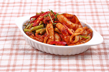 Spicy fried cowpea and squid with roasted chile paste.