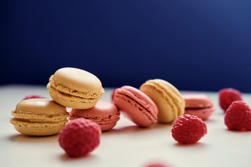 Delicious, colorful cookies on a wooden table.