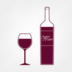 A bottle and a glass of wine