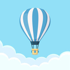 Obraz premium Hot air balloon in the sky with clouds. Flat cartoon design. Vector illustration
