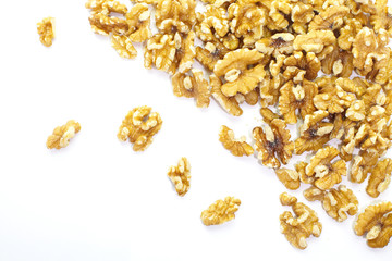 Close - up edible seeds walnut on white background