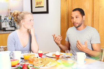 Couple arguing during breakfast
