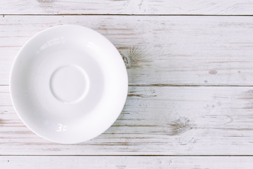 Dish on wooden background