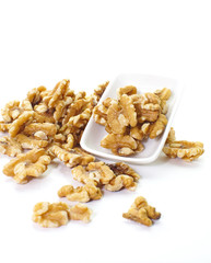 Close - up edible seeds walnut on white background