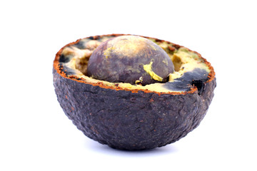 avocado, halved on white background