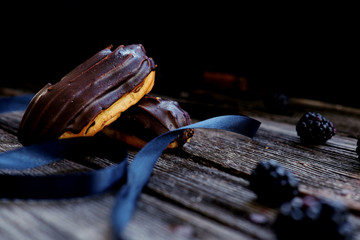 Delicious chocolate eclair on a table.