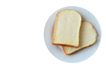 Slice of toast bread (selective focus) on plate isolated on white