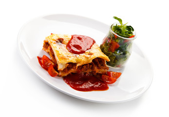 Lasagna on white background