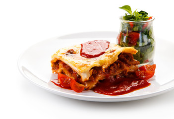 Lasagna on white background