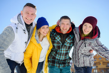 Cheerful group of friends posing for the camera.