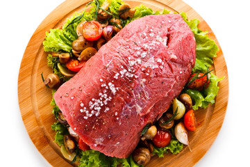 Raw beef on cutting board