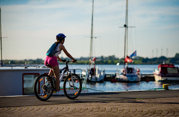 Girl biking in city