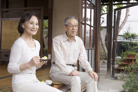 Couple sitting on a veranda