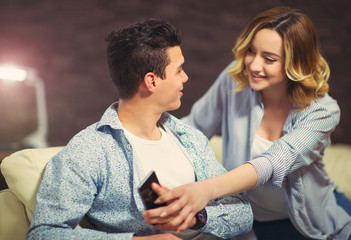 Couple has a problem. Woman wants to take the phone to her husband