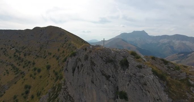 Aerial scenic catholic cross peak mountain alps