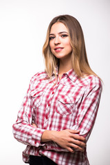Charming handsome. Handsome young women in casual wear keeping arms crossed and smiling while standing isolated on white background